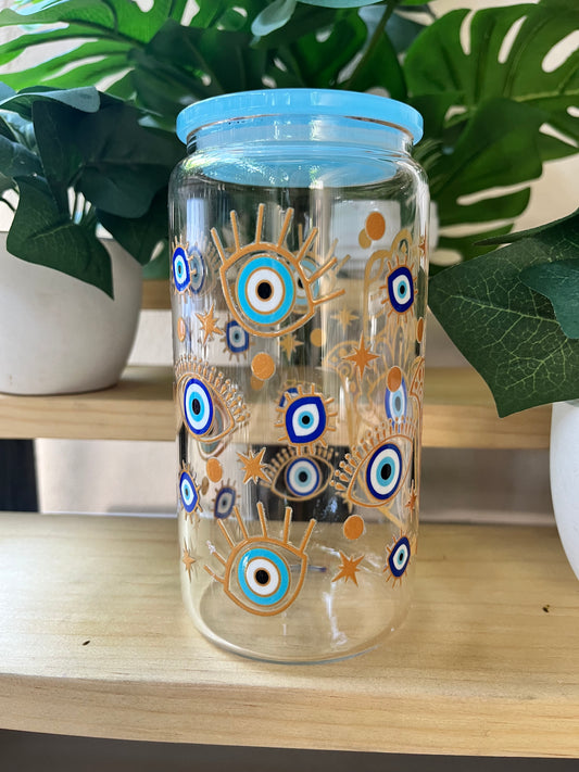 Glass cup with blue lid